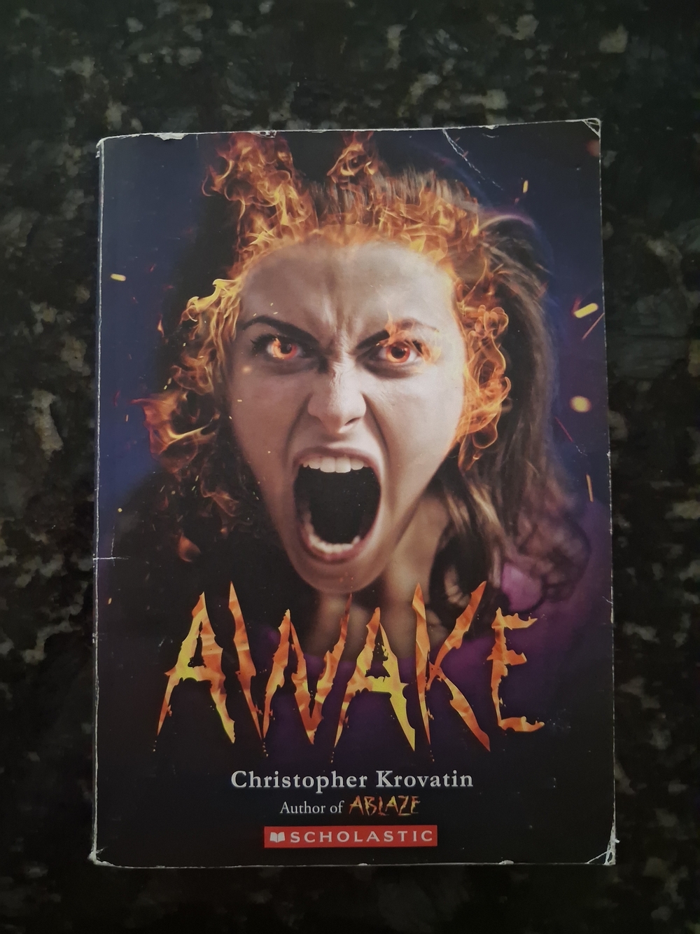 Scholastic 'Awake' Cover — Fiery Female Face with Flames